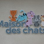 inscription sur la maison des chats